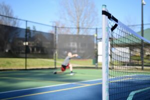 Boy playing Pickleball